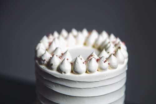 Ornate White Birthday Cake Photo