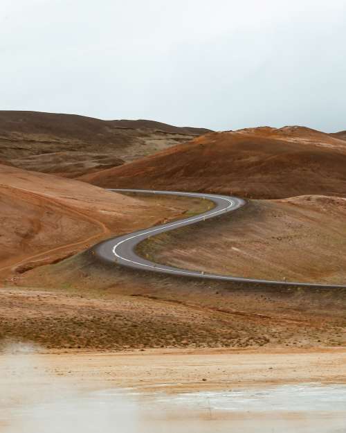Winding Road In The Sandy Desert Photo