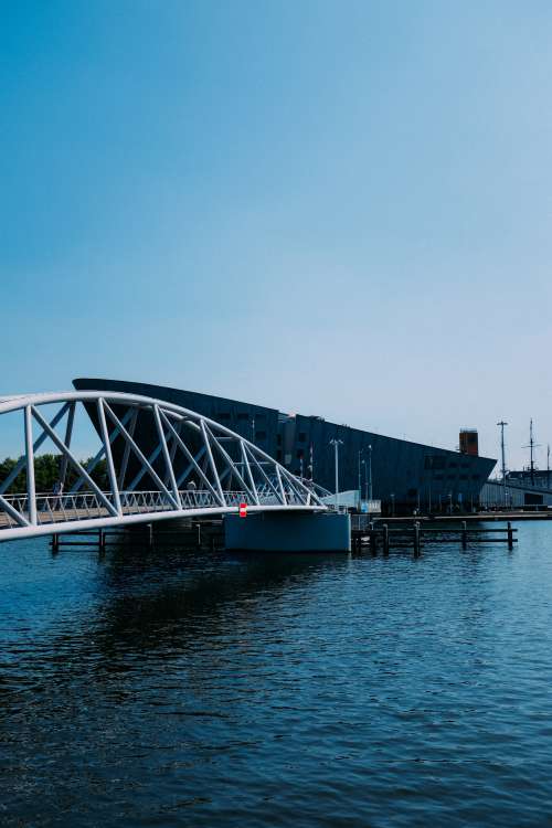 Round Bridge Stretches Over Water Photo
