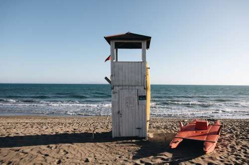 A Life Guard Hut On The Beach Photo