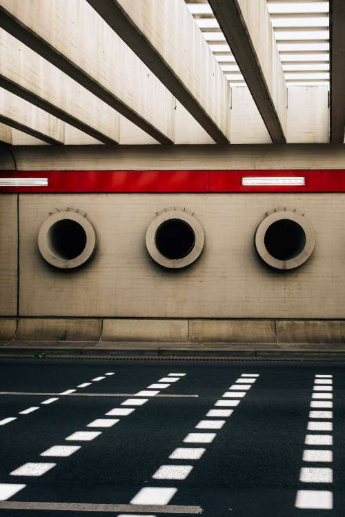 Black Holes In A Concrete Wall Photo