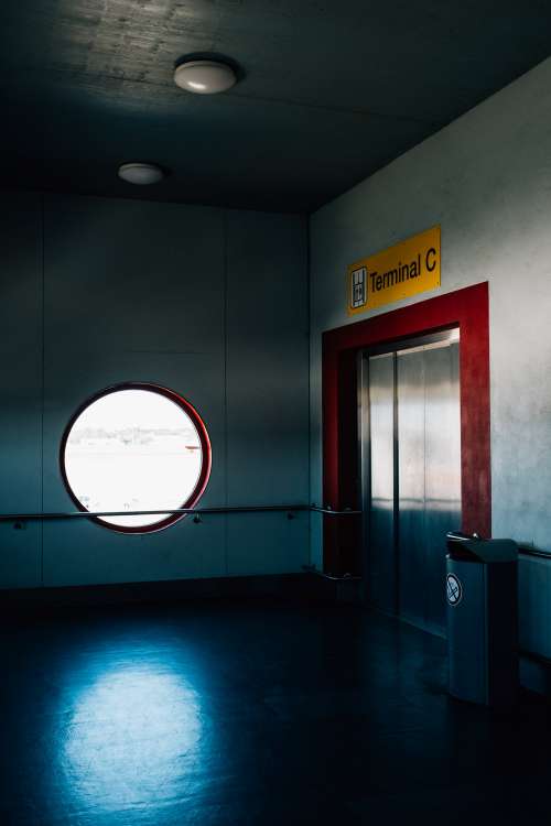 Lonely Elevator Door With Red Photo