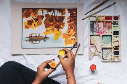 Hands Painting In Water Colors Photo