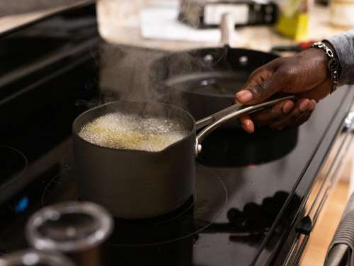 Boiling soup on stove top