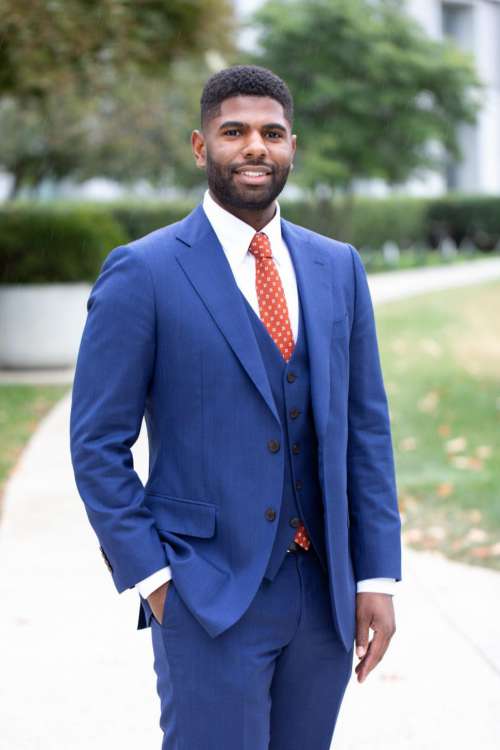 Young Businessman in Blue Three Piece Suit - looking at camera