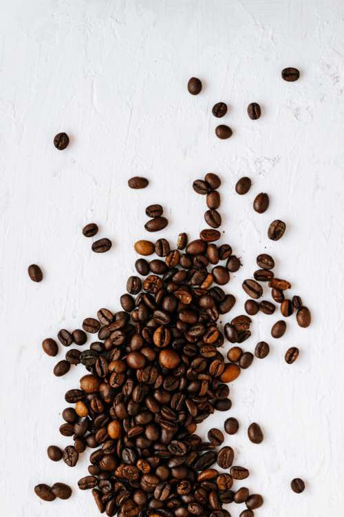 Dark roast coffee beans background