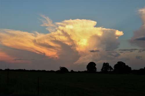 Storm Clouds At Sunset