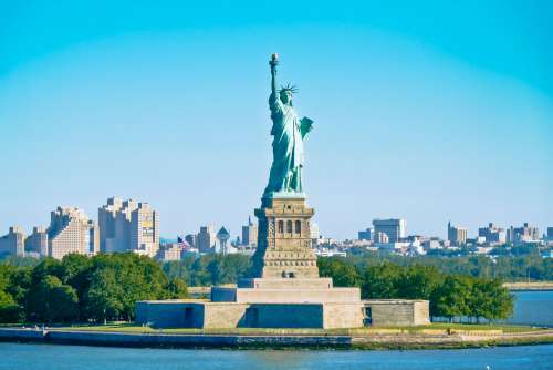 Statue Of Liberty Skyline And Blue Sky