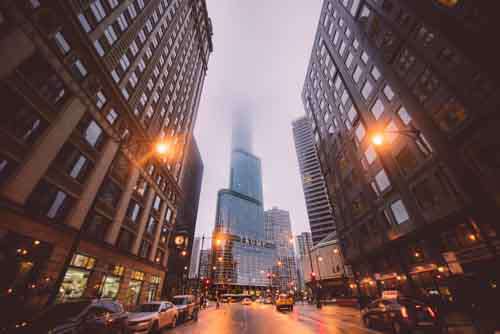 Chicago City Street At Dusk With Mist And Trump Tower
