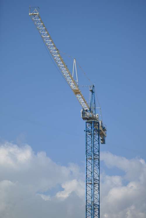 Large Industrial Crane In Blue Sky