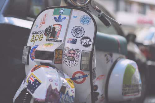 White Vespa With Punk Stickers