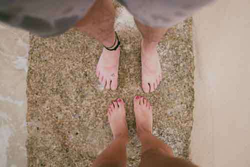 Cute Coupes Feet On A Beach
