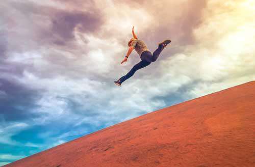 Free images of Man Jumping Down A Hill