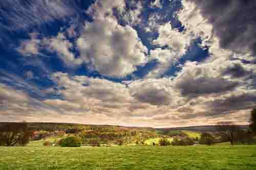 Beautiful English Landscape With Meadow And Dramatic Sky