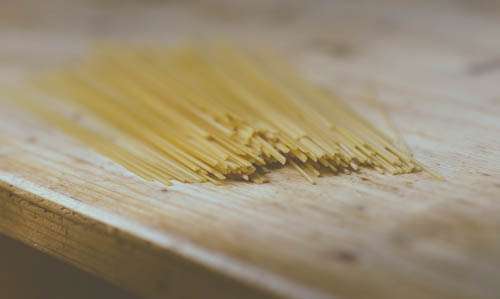 Raw spaghetti On Kitchen Table