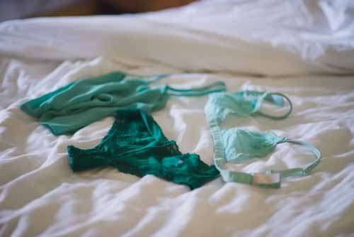 Green Ladies Underwear On Bed