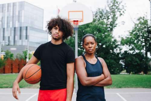 Man And Woman Together On The Court Photo