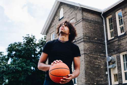 Young Basketball Player Looking Up Photo