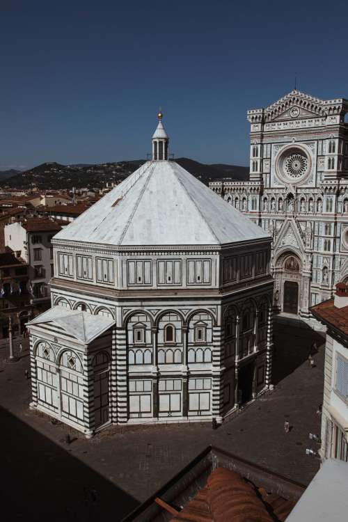 Angled View Of Italian Cathedral Under Blue Sky Photo