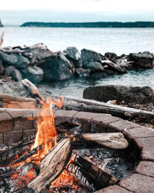 Wood Fire On A Cold Day By The Water Photo