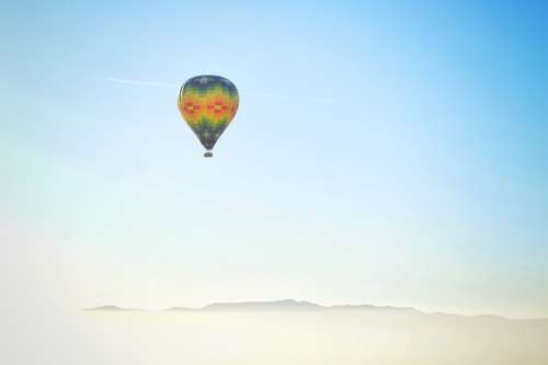 Hot Air Balloon Rising Into The Atmosphere Photo