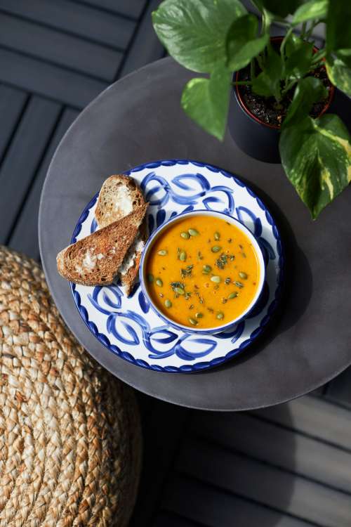 Bowl Of Soup And Rustic Crusty Bread Photo