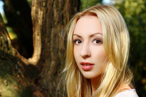 Young and attractive lady in park