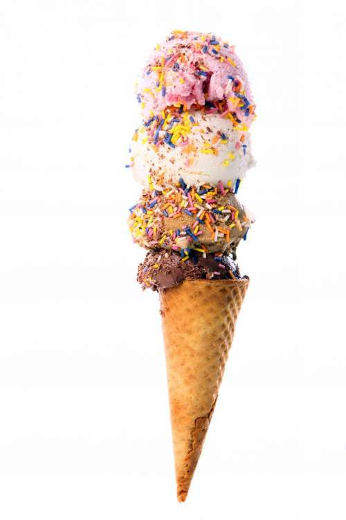 Four scoops of ice cream with sprinkles