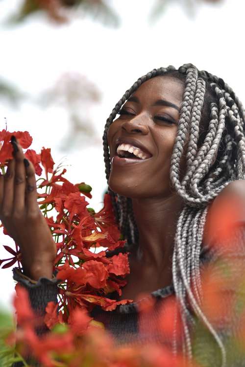 people, beauty, pretty girl, nice, style, pose, posture, elegant, makeup, aesthetic, smile, fashion, facial expression, red flowers, braids, hairstyle, haircut, girl, woman, joyful, happiness, good vibes