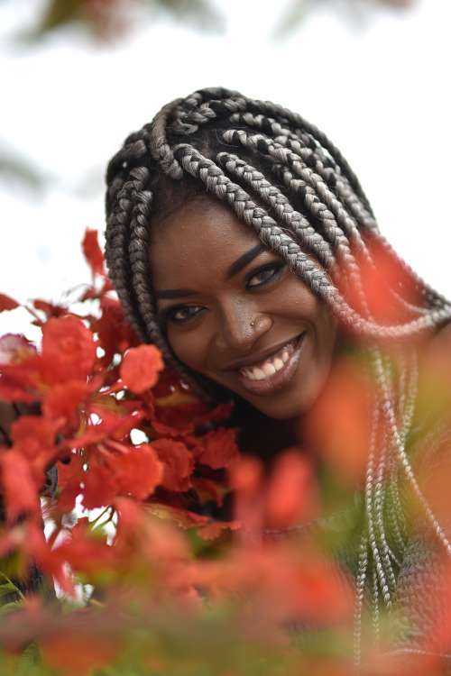 people, beauty, pretty girl, nice, style, pose, posture, elegant, makeup, aesthetic, smile, fashion, facial expression, red flowers, braids, hairstyle, haircut, girl, look, woman, happiness, joy, fun