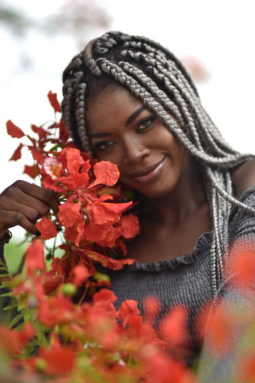 people, beauty, pretty girl, nice, style, pose, posture, elegant, makeup, aesthetic, smile, fashion, facial expression, red flowers, braids, hairstyle, haircut, girl, look, woman, happiness, joy