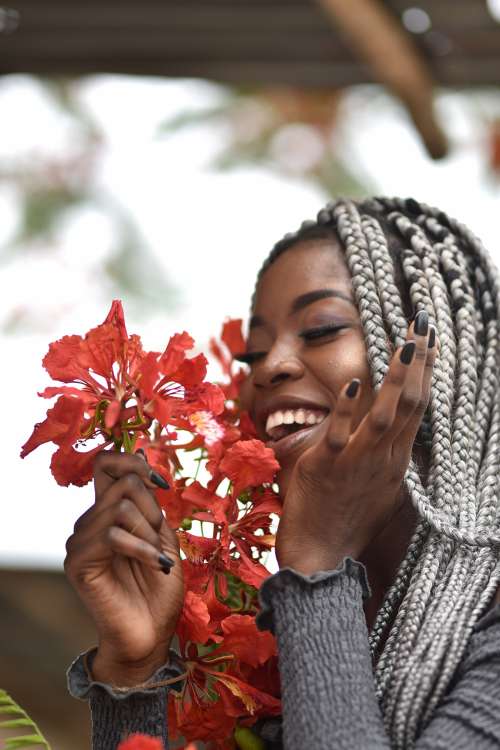 people, beauty, pretty girl, nice, style, pose, posture, elegant, makeup, aesthetic, smile, fashion, facial expression, red flowers, braids, hairstyle, haircut, girl, woman, good vibes, happiness, joy