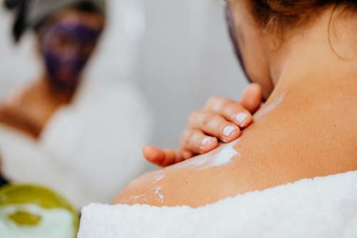 Skincare routine - Middle-Aged Woman in Bathroom