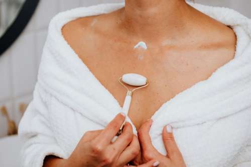 Skincare routine - Middle-Aged Woman in Bathroom