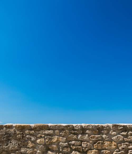 Stone Wall And Sky