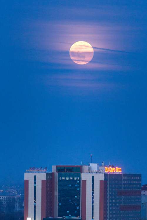Full Moon Above a Hotel