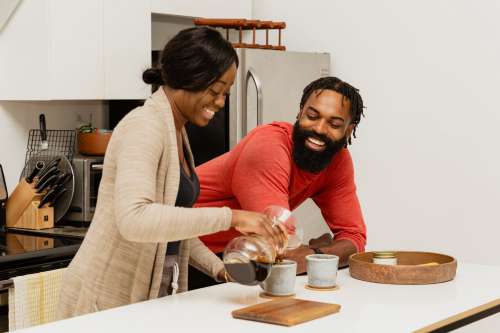 Couple Making Pour Over Coffees Photo