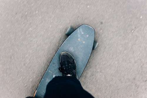 Look Down At Beaten Skateboard Photo
