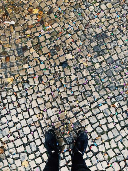 Cobblestone Streets And Littered Confetti Photo