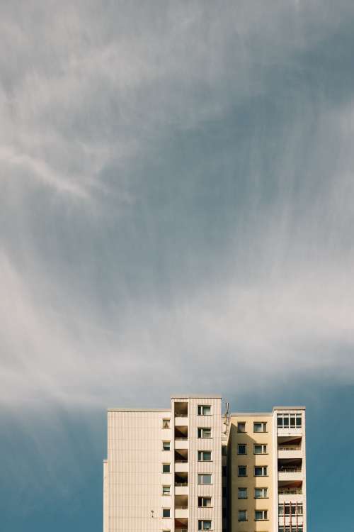 White Buildings Reach High Toward The Clouds Photo