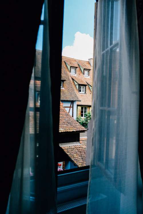 Rooftops As Seen Through A Window Photo