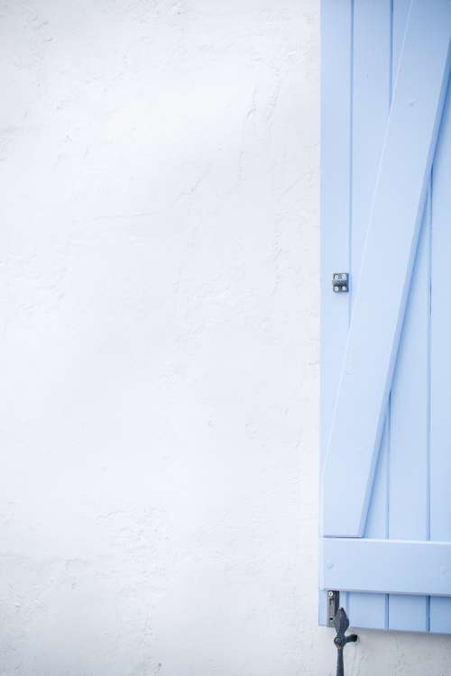 A Plain Blue Wooden Door Photo