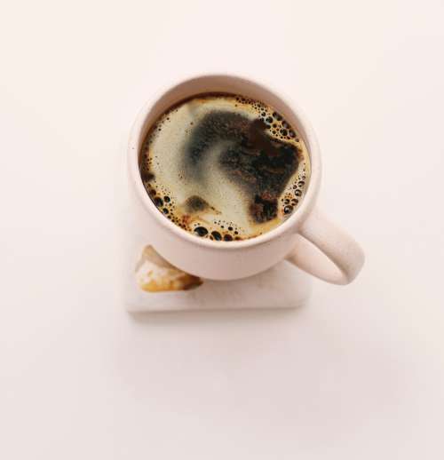 Black Coffee In A Pale Pink Mug Photo