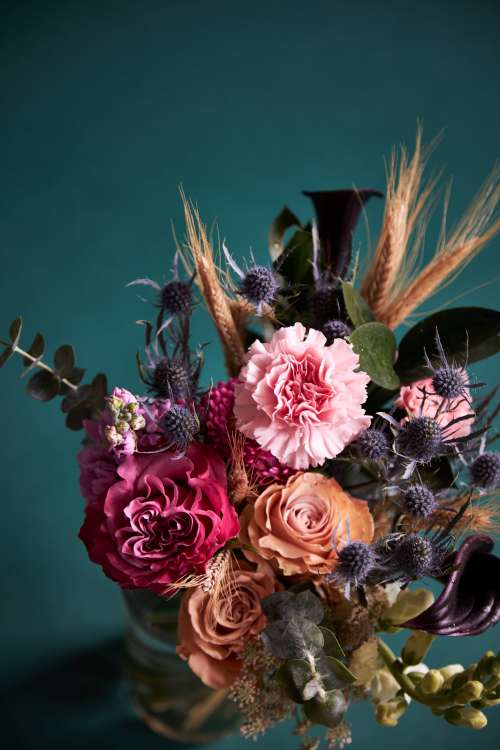 Close Up Vivid Flower Arrangement In All Colors Photo
