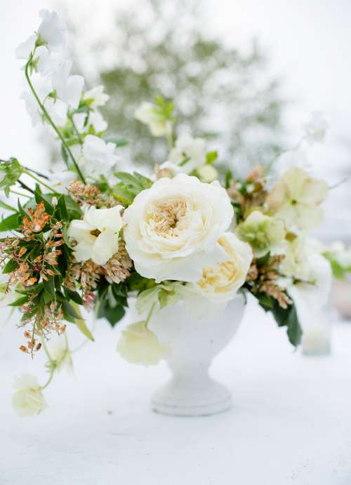 A Table Bouquet With Green Accents Photo