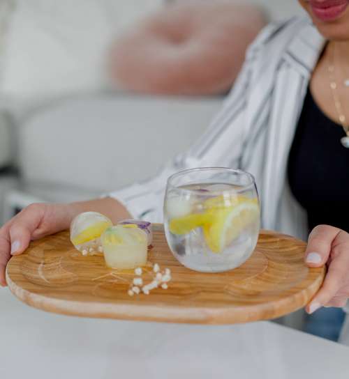 Cocktail With Lemon And Decorated Ice Cubes Photo