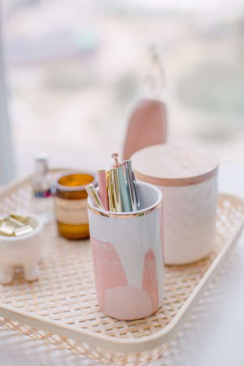 Blush Pink And Wicker Stationary Organizer Photo