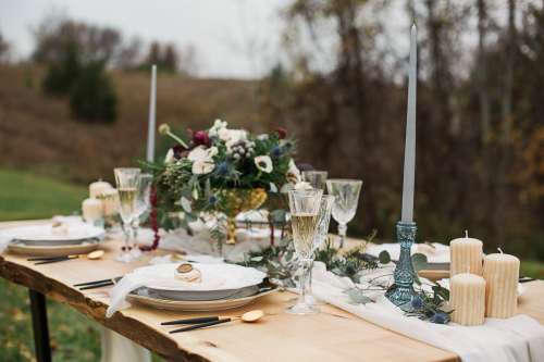 A Wedding Table Decorated With Flowers Photo