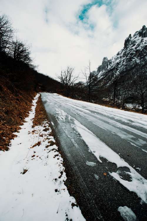A Slush Covered Lonely Winter Road Photo