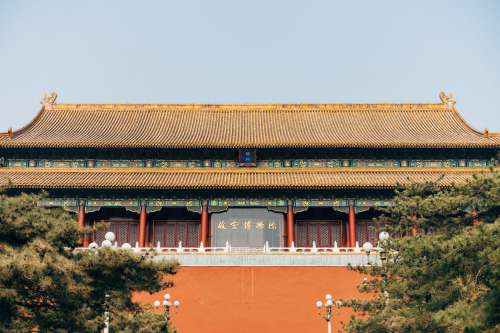 Long Chinese Temple With Golden Rooftops Photo
